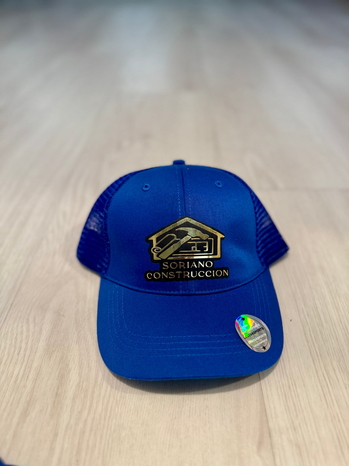 Completed blue Soriano cap with its front logo and brim visible