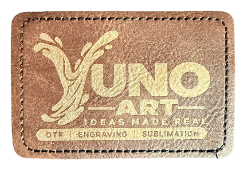 Brown rectangular stitched patch engraved with the YUNO ART logo