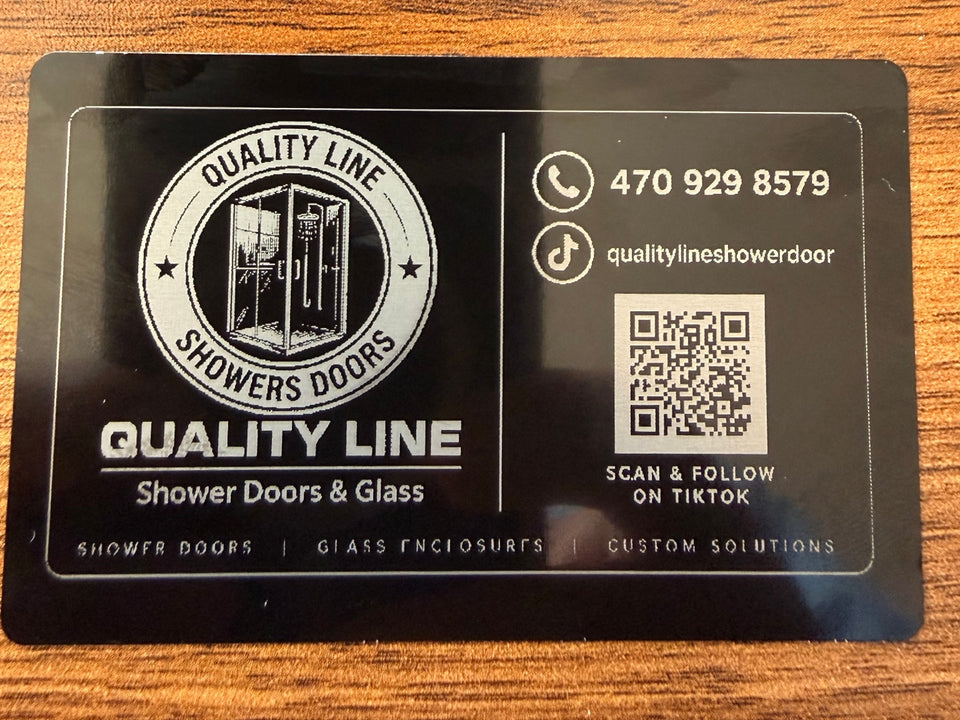Black plaque engraved with Quality Line client artwork